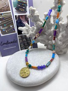 Multicolor kralenketting met bedel ster