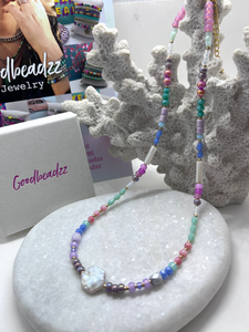 Pastel kralenketting met schelpkraal