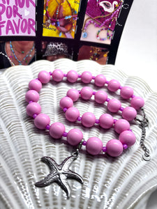 Roze kralenketting met zilveren zeester klein