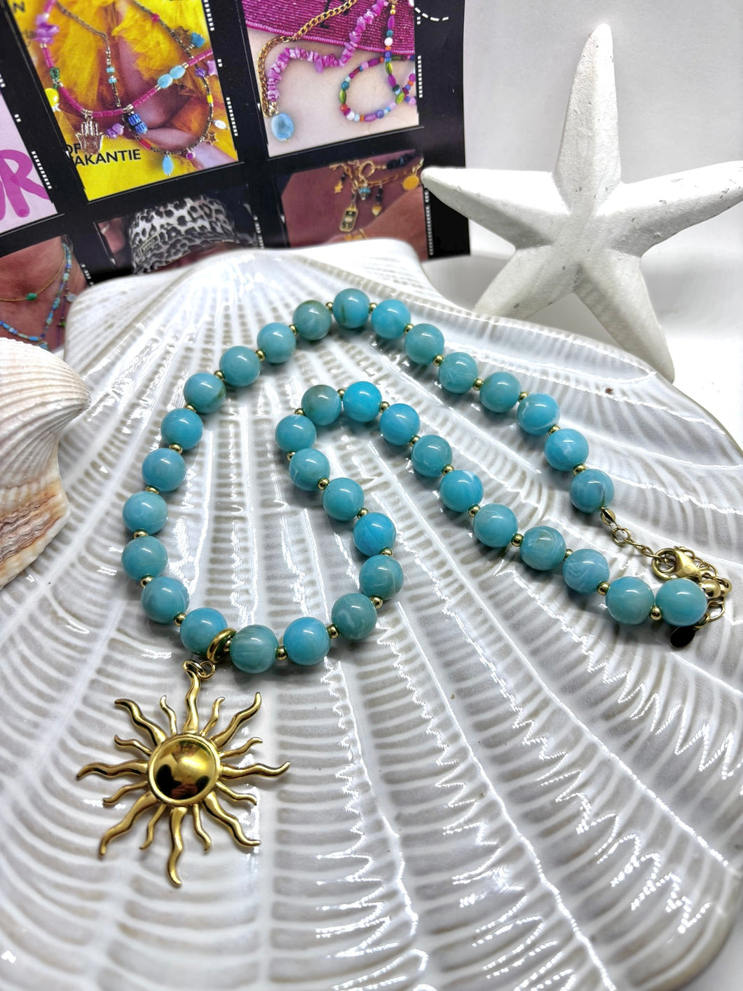Kralenketting met afneembare zon bedel