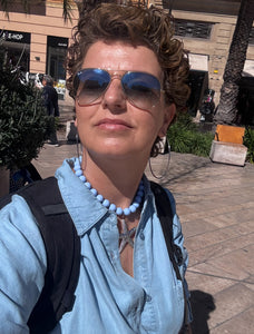 Blauwe kralenketting met grote zeester