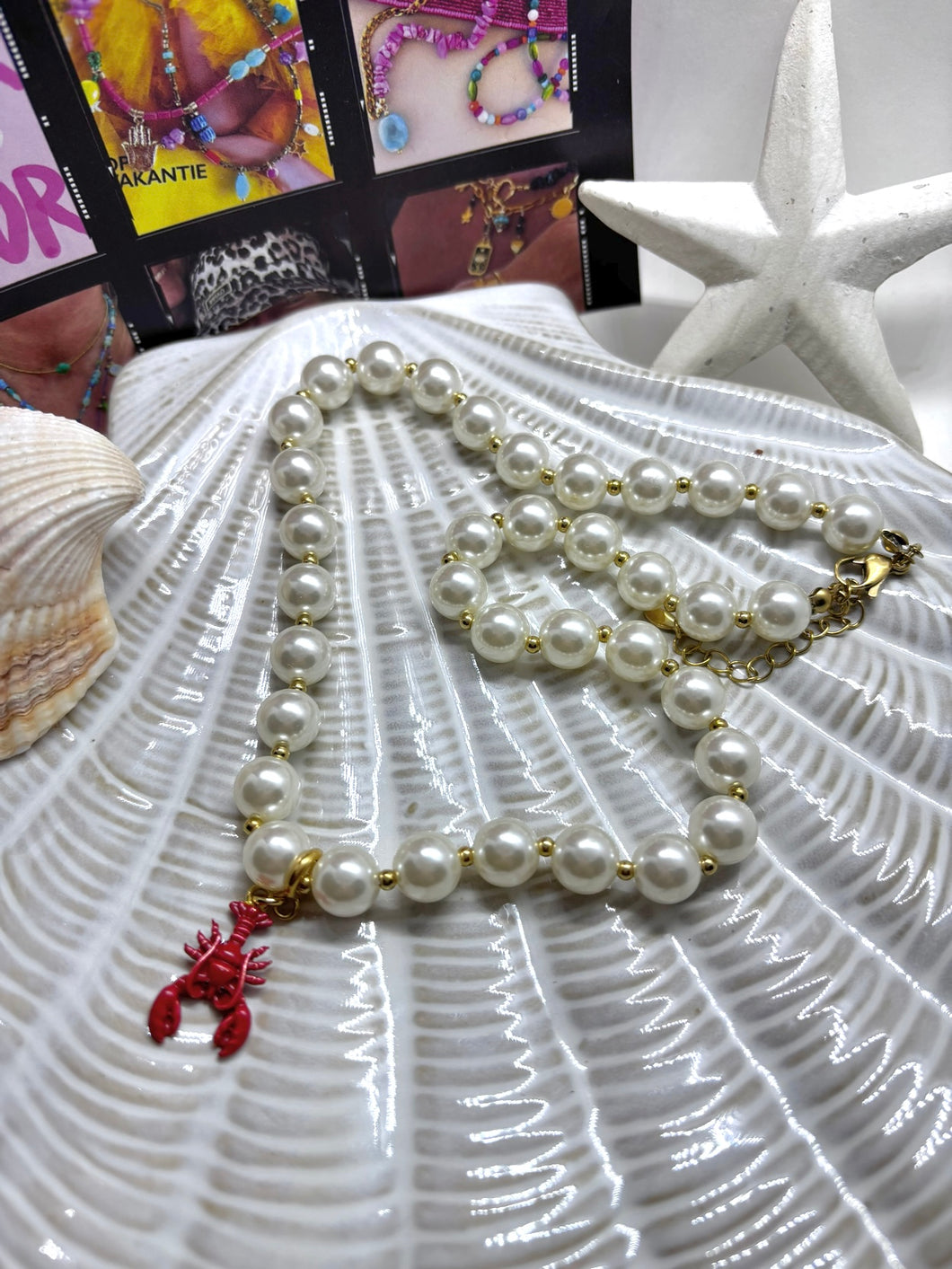 Kralenketting parel met afneembare kreeft bedel