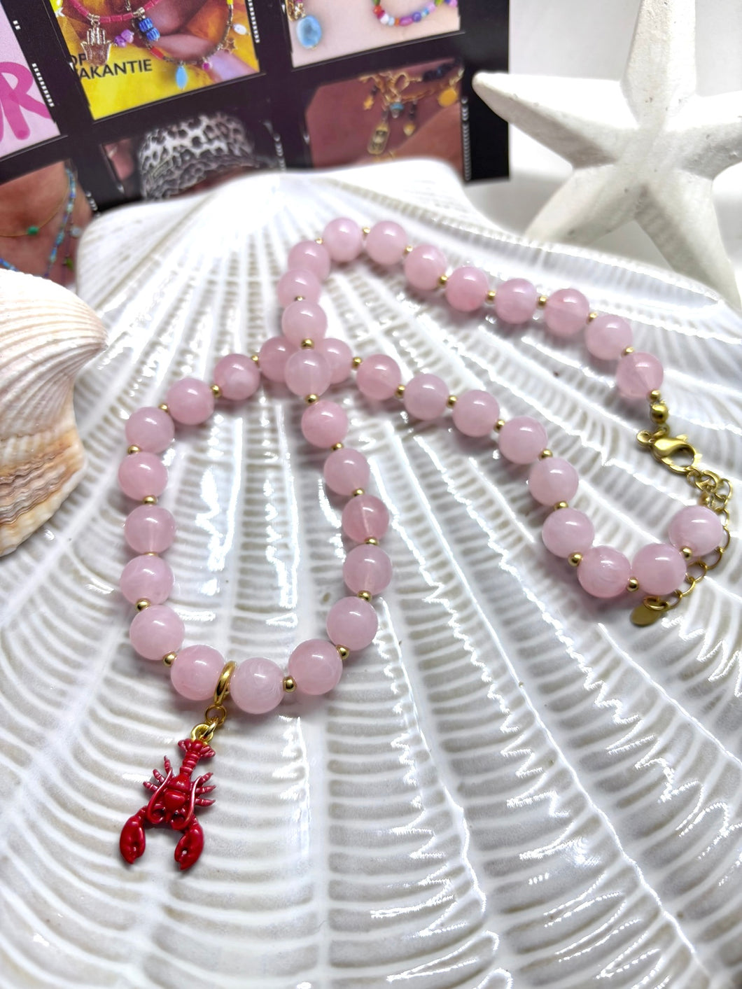 Roze kralenketting met afneembare kreeft bedel