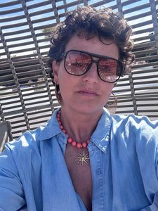 Oranje kralenketting met verwijderbare Zon bedel “Sunshine”